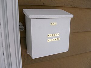 Mailbox built from particle board with hinges.jpg